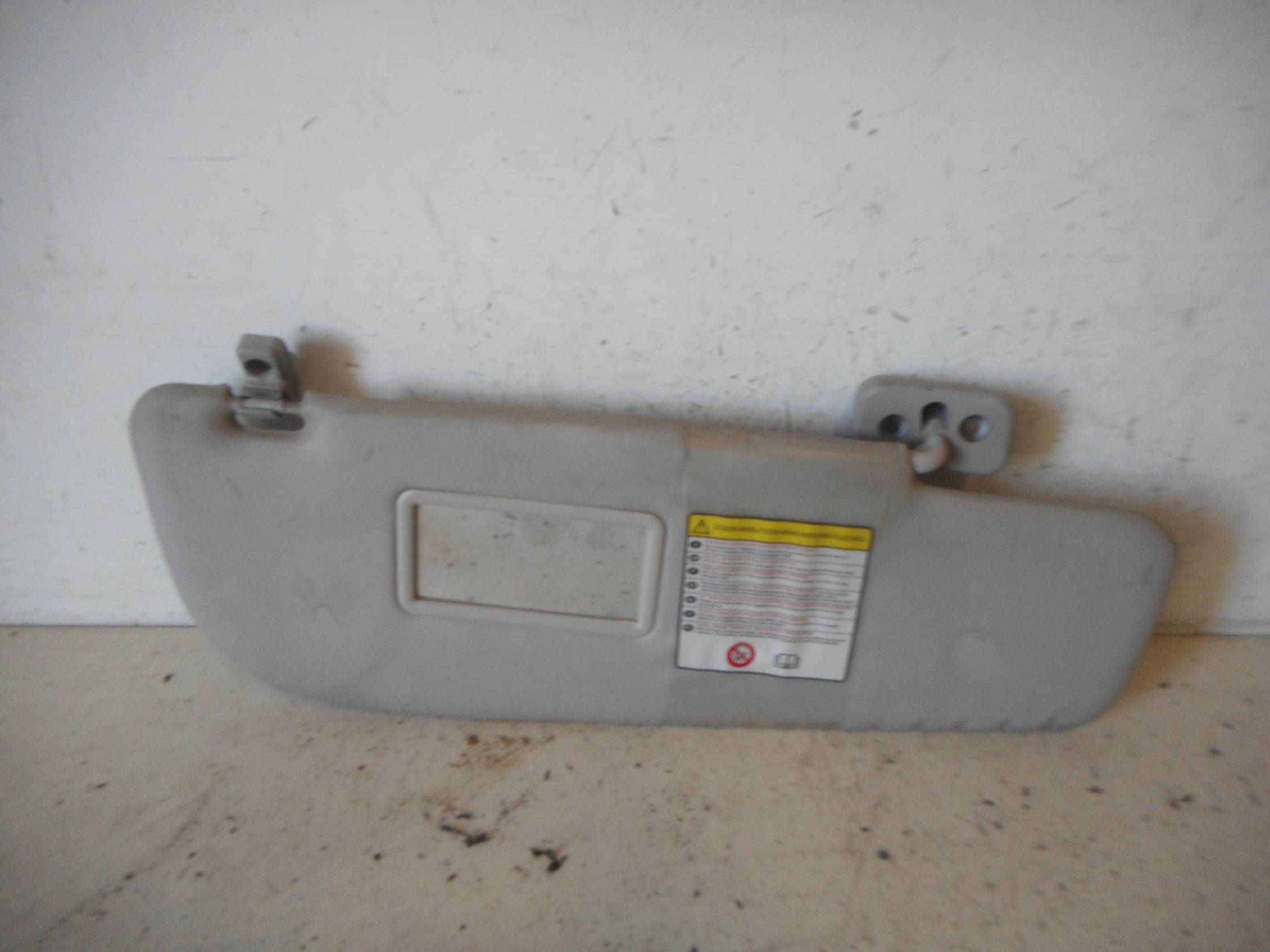 Aletta parasole parabrezza dx.